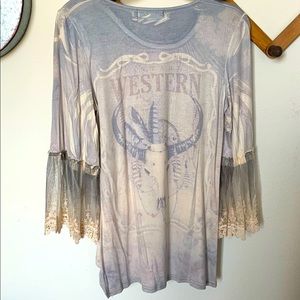 Western shirt with lace sleeves.